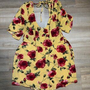 Yellow Floral Romper with Lace-Up Back